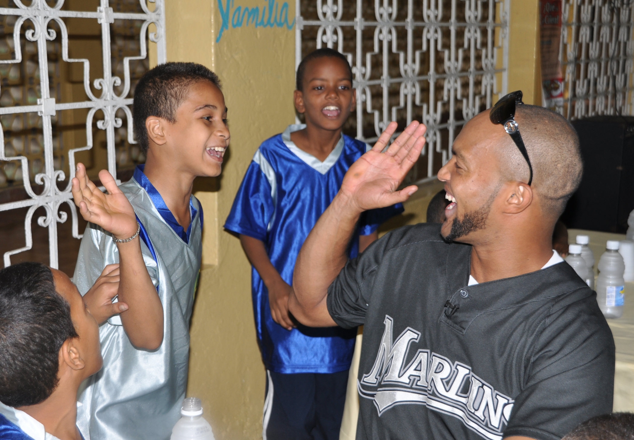 Newly branded Marlins baseball team donates old uniforms to kids